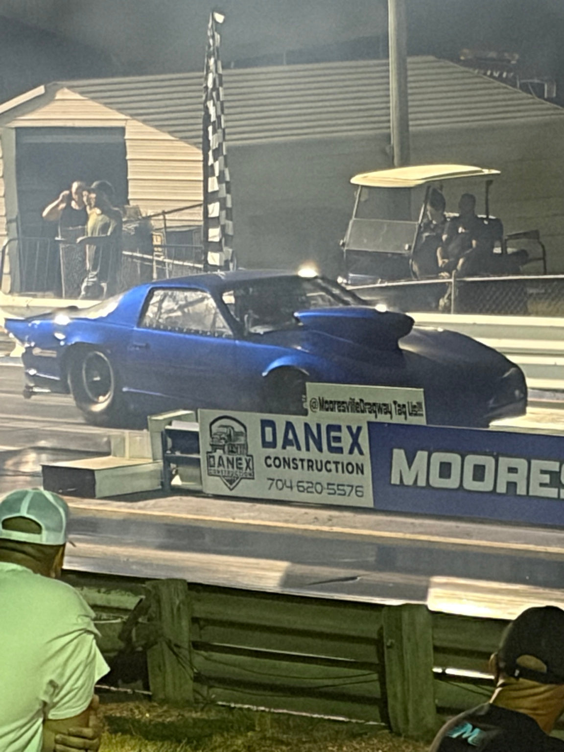Cars staged at the starting line at Mooresville