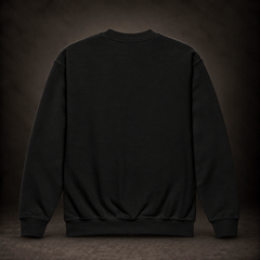 Back of black youth crewneck sweatshirt, plain with no print