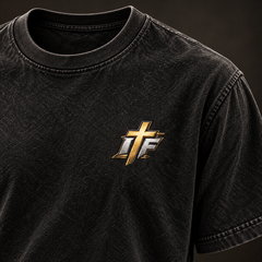 Close-up of gold IFR cross logo on left chest of washed black tee