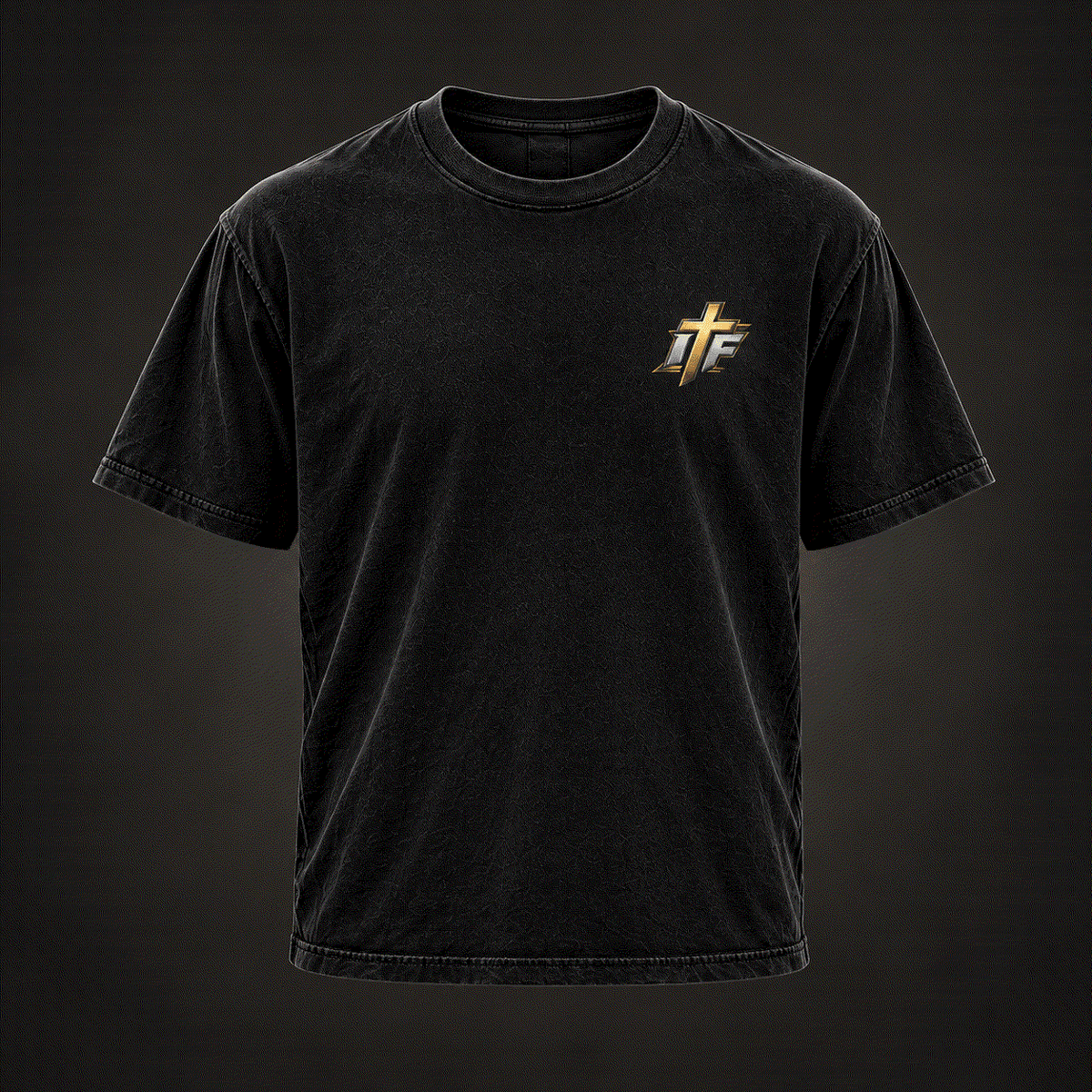 Front of For His Glory Tee, washed black with small gold IFR cross logo on chest