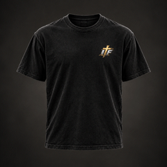 Front of Everything Before Green Matters Tee, washed black with small gold IFR cross logo on chest